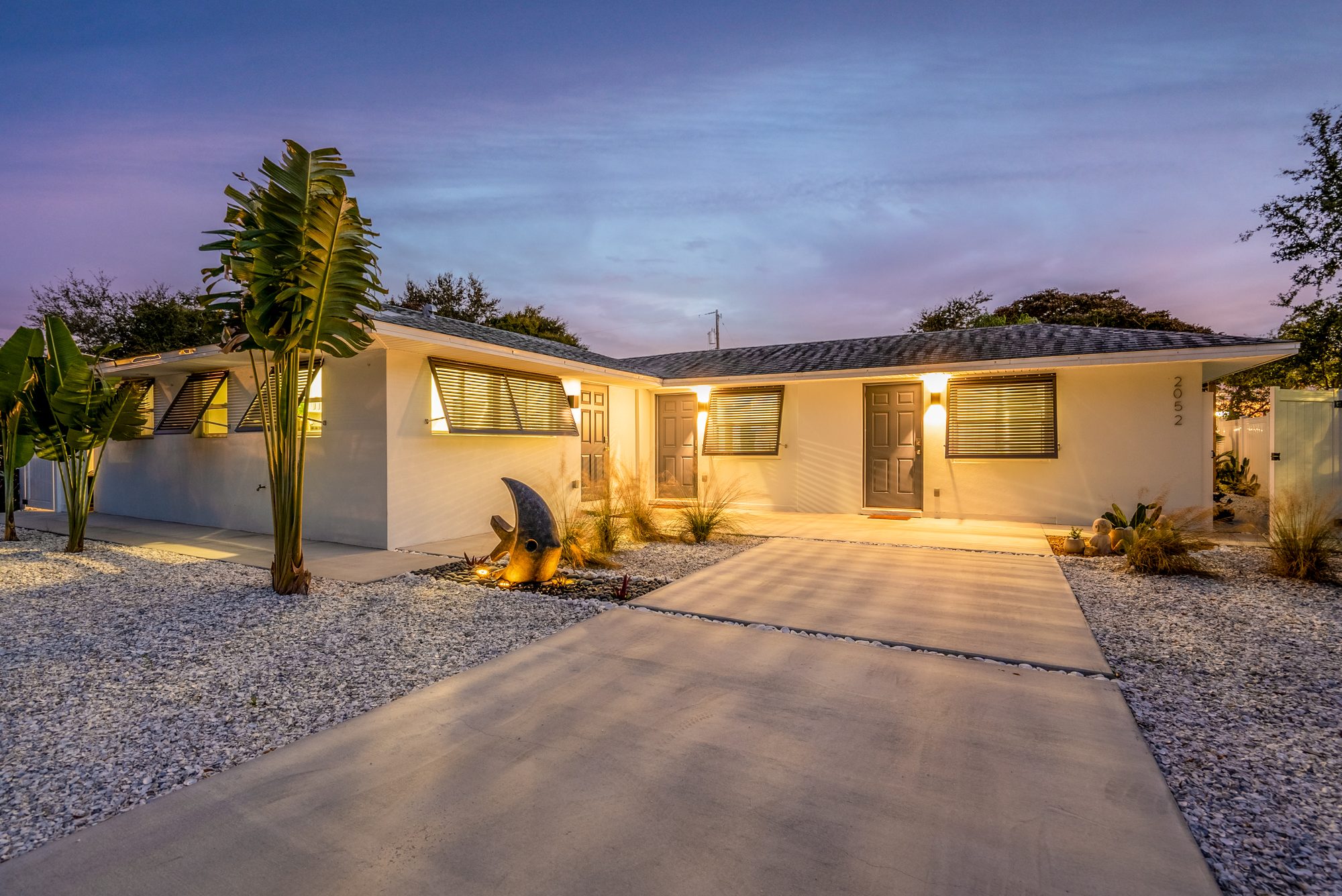 Renovated Sarasota home exterior at twilight