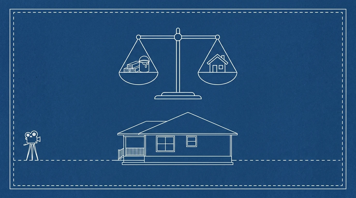 Blueprint-style illustration of a balance scale weighing a stack of building materials against a small house, above the side elevation of a low slab-on-grade coastal house with a dashed datum line, a camera on a tripod at the left