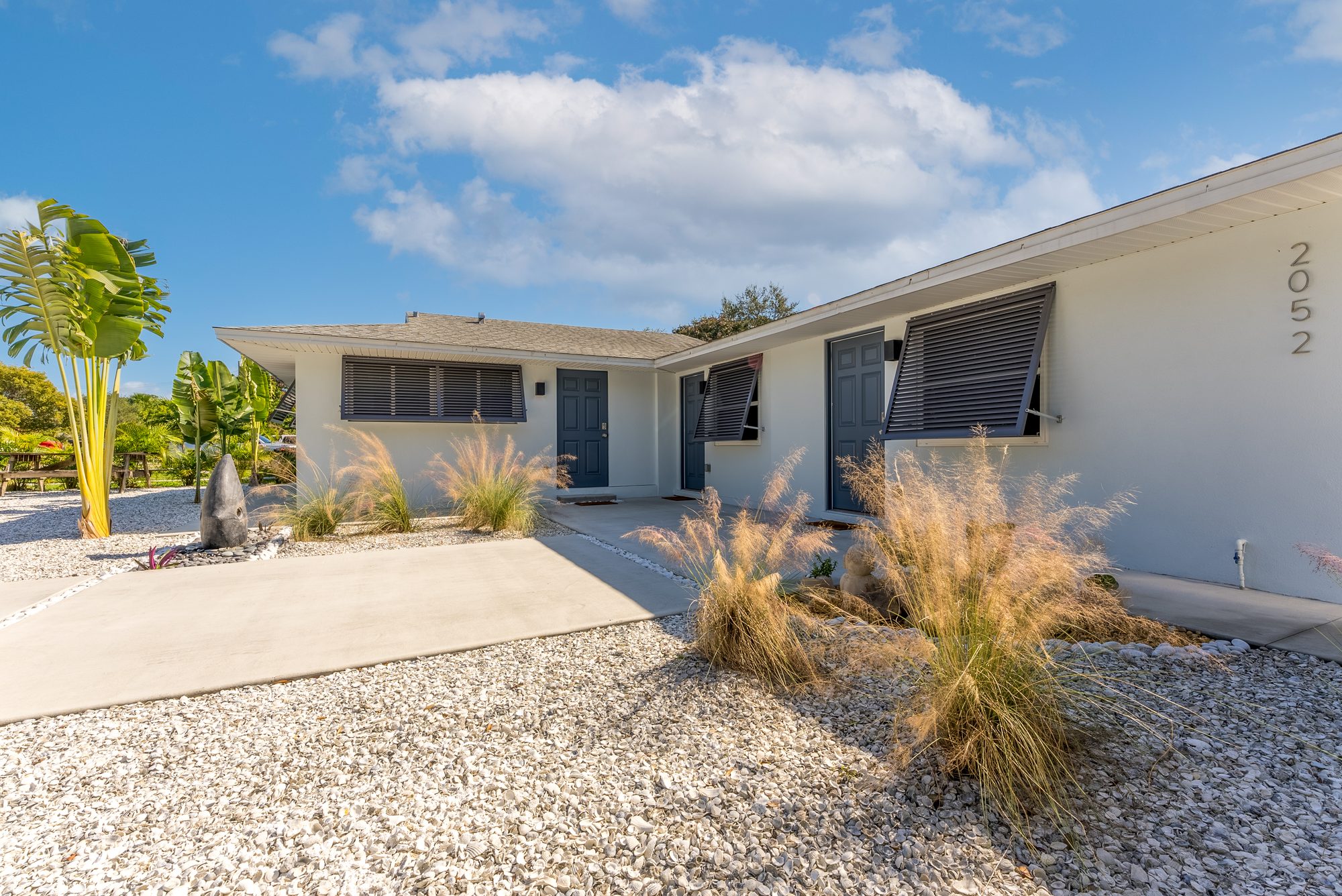 Front approach of a renovated single-story Sarasota home